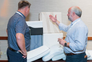 Table top sponsor displaying custom recycled foam during the ISPA Sustainability Conference